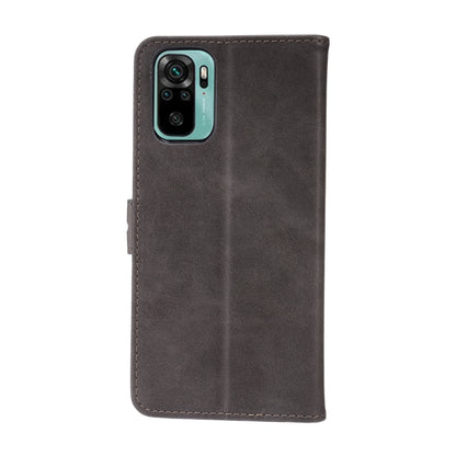 Grey leather flip phone case with embossed cat and stitched edges