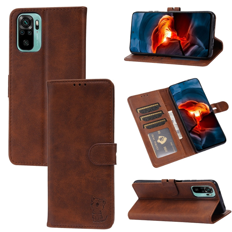 Brown leather flip phone case with embossed cat, card slots, and stand holder