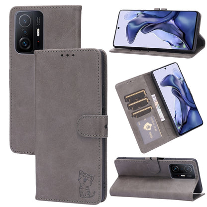 Grey leather flip phone case with embossed cat, card slots, and stand holder
