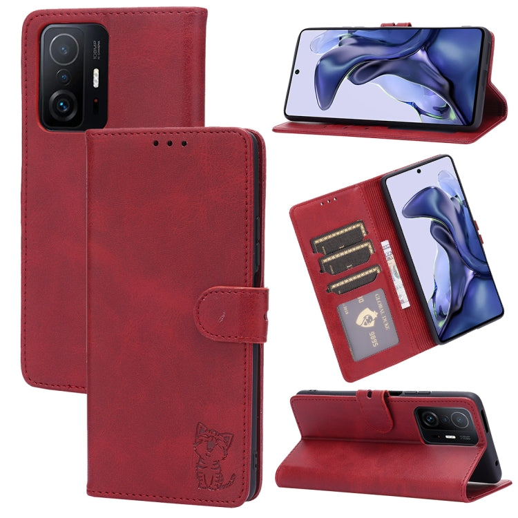 Red leather flip phone case with embossed cat, card slots, and stand holder