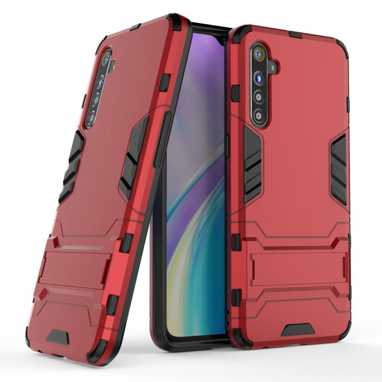 Red rugged shockproof phone case with holder, raised corners and camera cutout