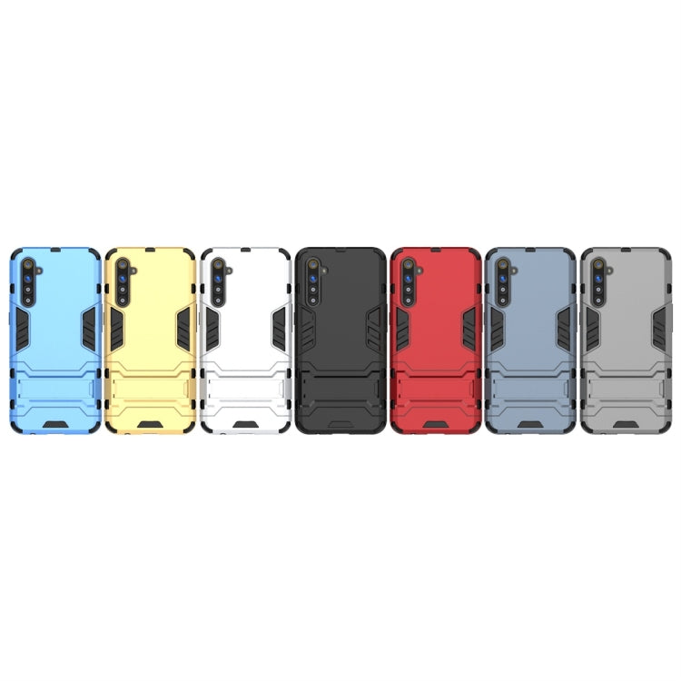 Assorted shockproof phone cases with holder in multiple colors, rugged armor design