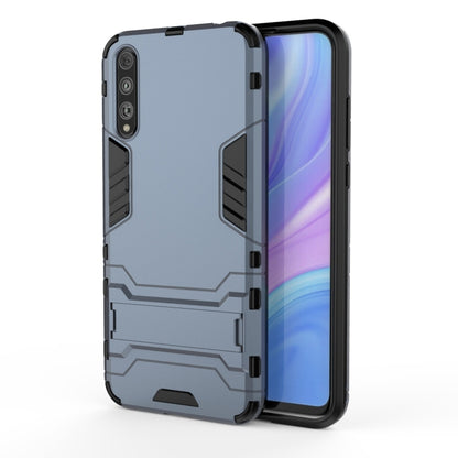 Rugged shockproof phone case in navy blue, protective back and side armor