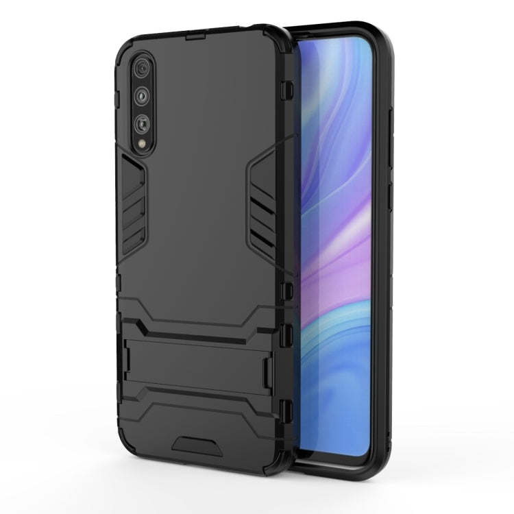 Rugged shockproof phone case in black PC+TPU, with raised edges and cutouts