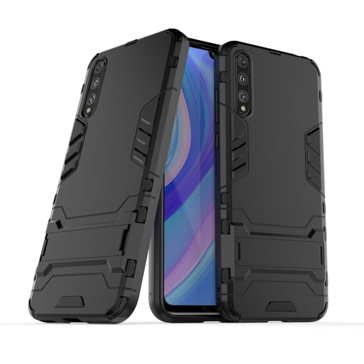 Rugged shockproof phone case in black, front and back with protective rail accents