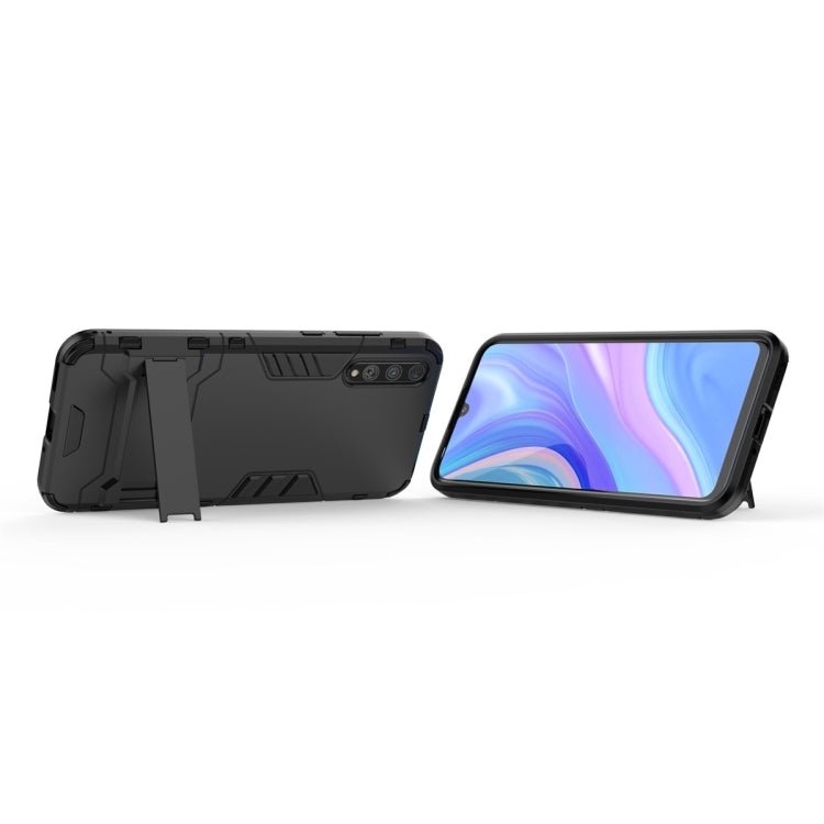 Rugged shockproof phone case in black, back cover with kickstand-style holder