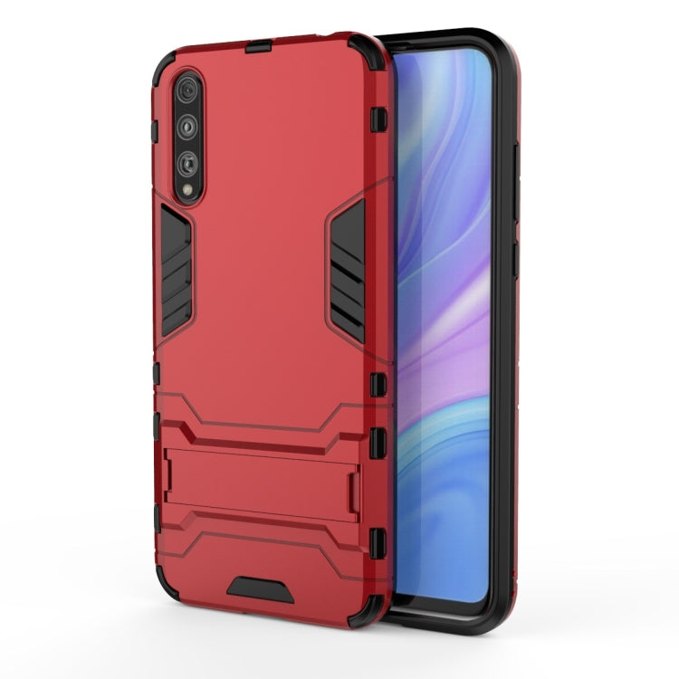 Red shockproof rugged phone case with textured grips and camera cutouts