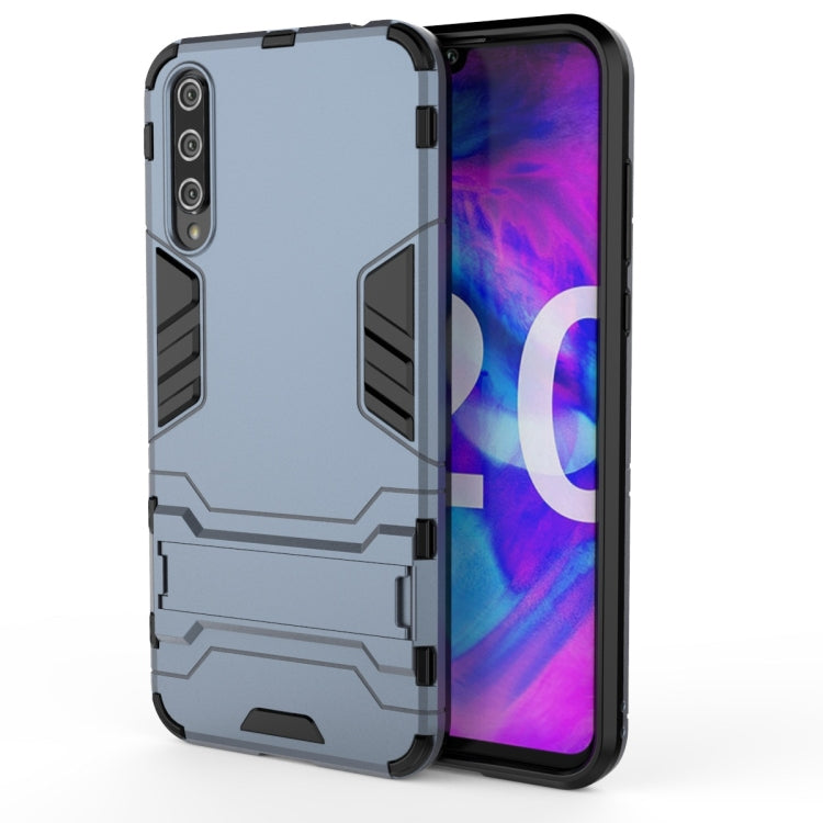 Rugged shockproof phone case in navy blue, front and back coverage with cutouts