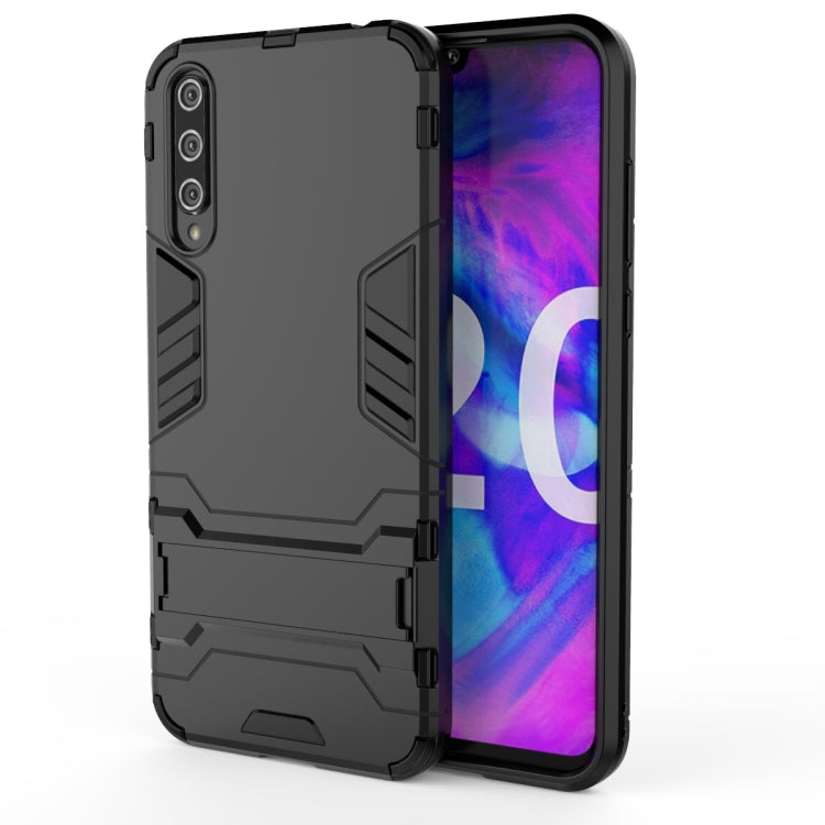 Rugged shockproof phone case in black, slim shield design with invisible holder
