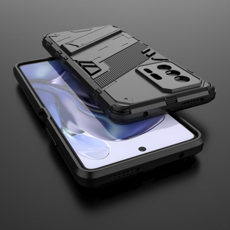 Black rugged phone case with kickstand and reinforced edge protection