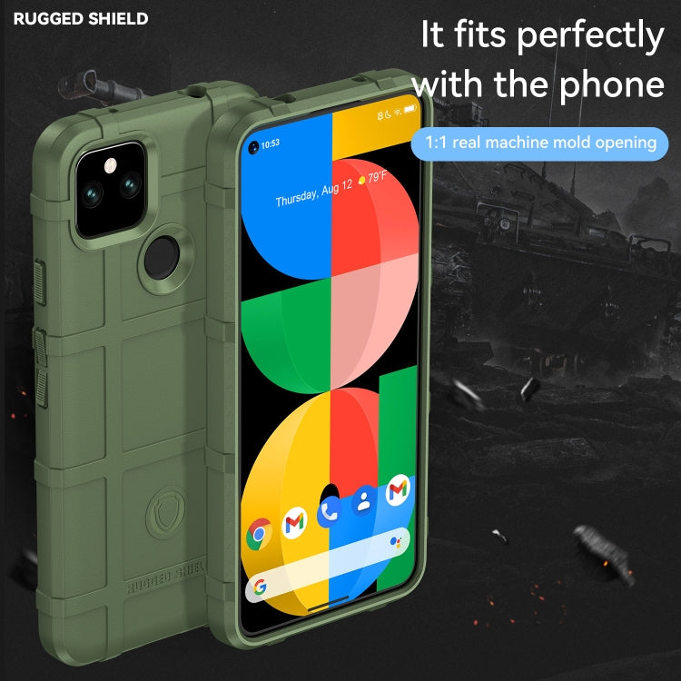 Green rugged TPU phone case with ring grip, camera cutout, and raised front edges