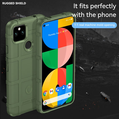 Green rugged TPU phone case with ring grip, camera cutout, and raised front edges