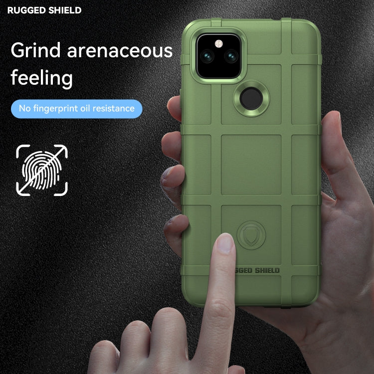 Green rugged TPU phone case with textured grip, ring holder, and dual camera openings