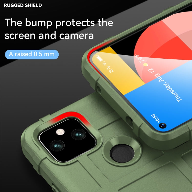 Green TPU case corner with raised screen and camera protection around lens cutouts