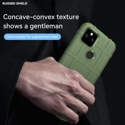 Green TPU phone case with concave-convex textured backing and camera cutout, ring grip