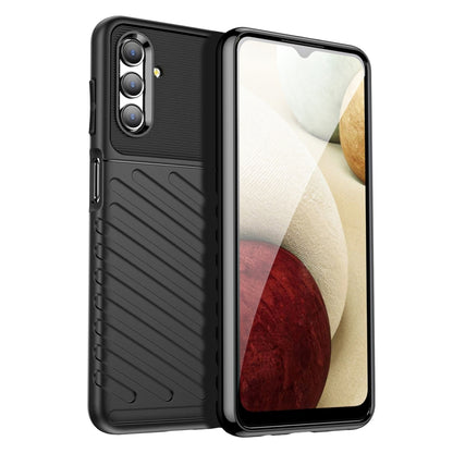 Black shockproof TPU phone case with textured grip and camera cutouts