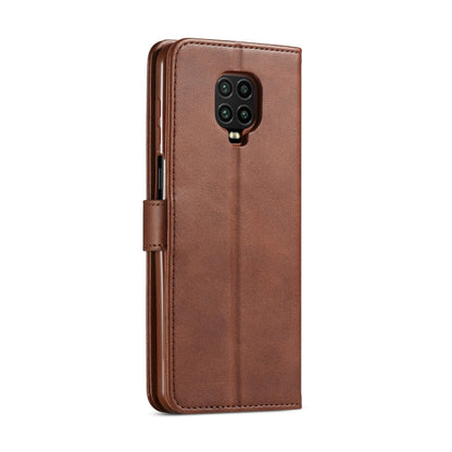 Brown textured leather flip phone case with camera cutout and side openings