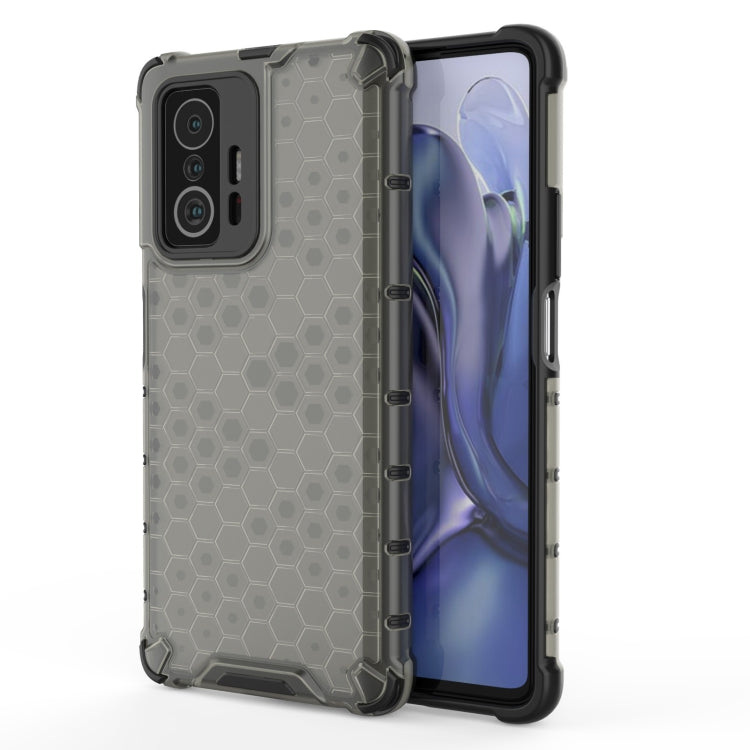Dark honeycomb shockproof phone case with rugged bumper, raised corners, camera cutouts.
