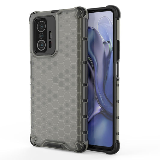Dark honeycomb shockproof phone case with rugged bumper, raised corners, camera cutouts.