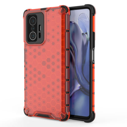 Red orange honeycomb shockproof phone case with rugged bumper and camera opening.