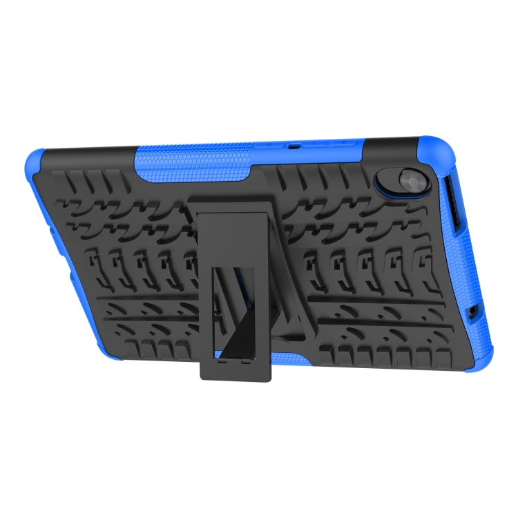 Blue rugged tablet case with tire-texture back and kickstand in upright position