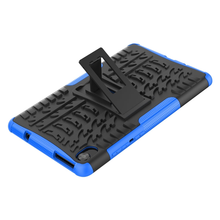 Blue rugged tablet case with tire-texture back and kickstand stand for viewing