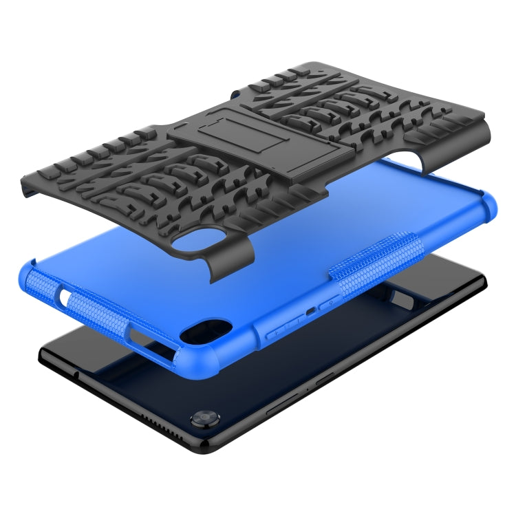 Blue rugged tablet case with tire-texture cover and kickstand set for viewing
