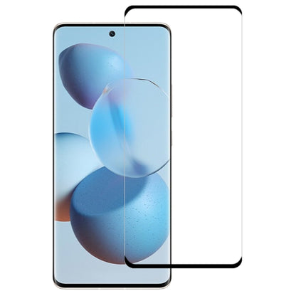 Tempered glass screen protector with curved edges fitted over a smartphone display