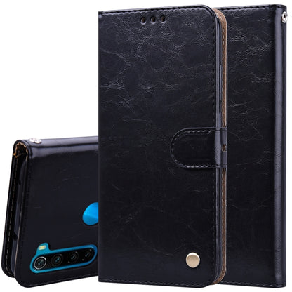 Black flip leather phone wallet case with card slot pocket and magnetic snap, textured finish