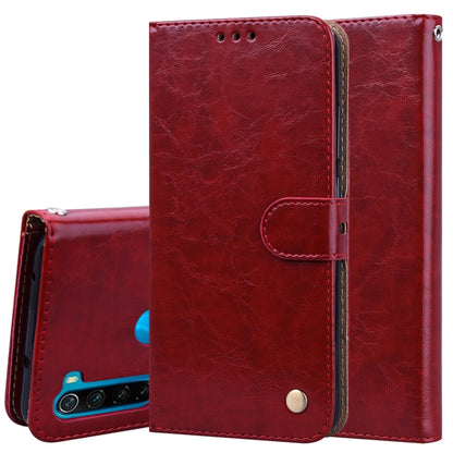 Red flip leather phone wallet case with card slot pocket and magnetic snap, textured finish