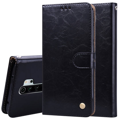 Black flip leather phone wallet case with card slot pocket and magnetic snap, oil-wax texture