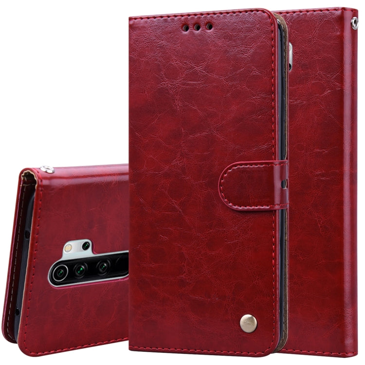 Red flip leather wallet phone case with card holder and magnetic closure.