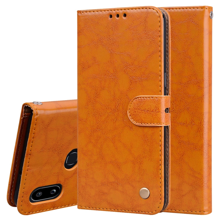 Orange flip leather wallet phone case with card holder and camera cutout.