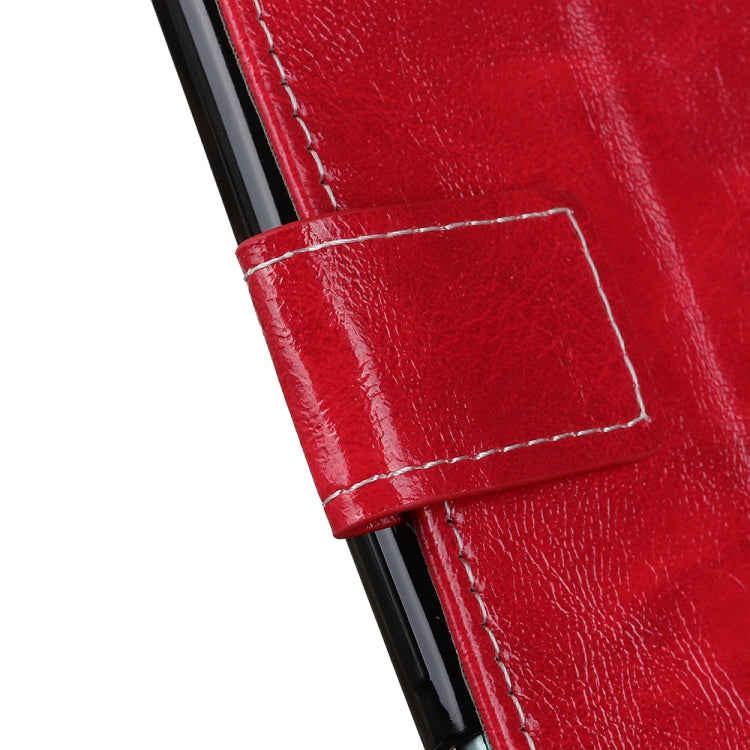 Red leather folio case close-up of stitched flap and reinforced corner