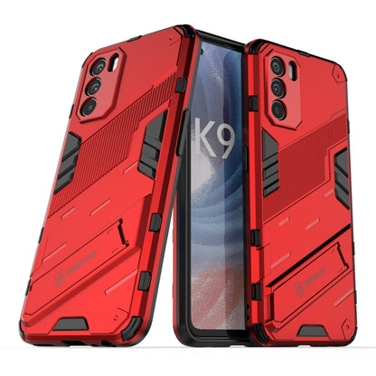 Rugged red phone case with textured grip, raised edges, and dual-layer protection