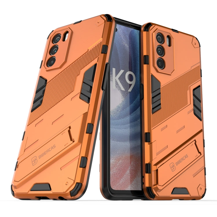 Orange 2-in-1 PC+TPU shockproof phone case, rugged armor design with camera cutouts