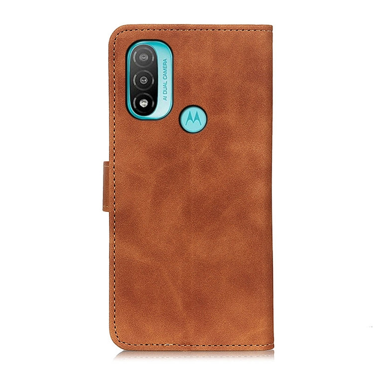 Brown leather flip phone case with camera cutout and Motorola logo