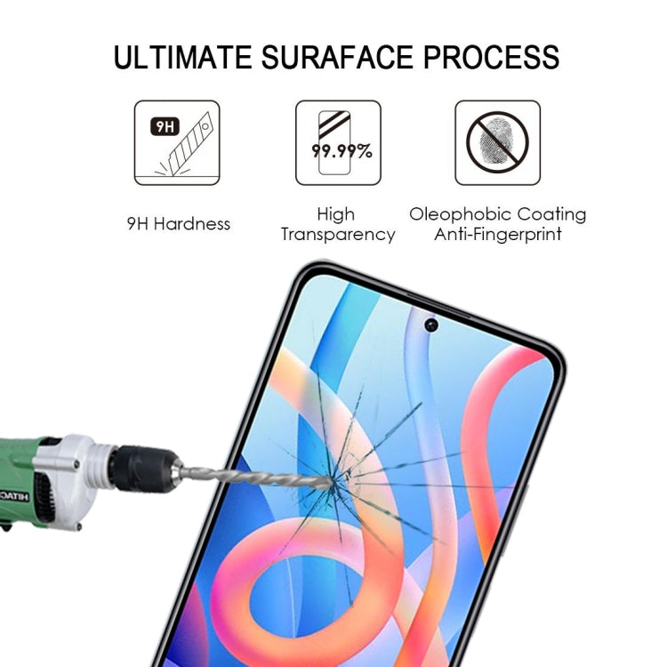 Tempered glass screen protector shown on a smartphone screen during impact test.