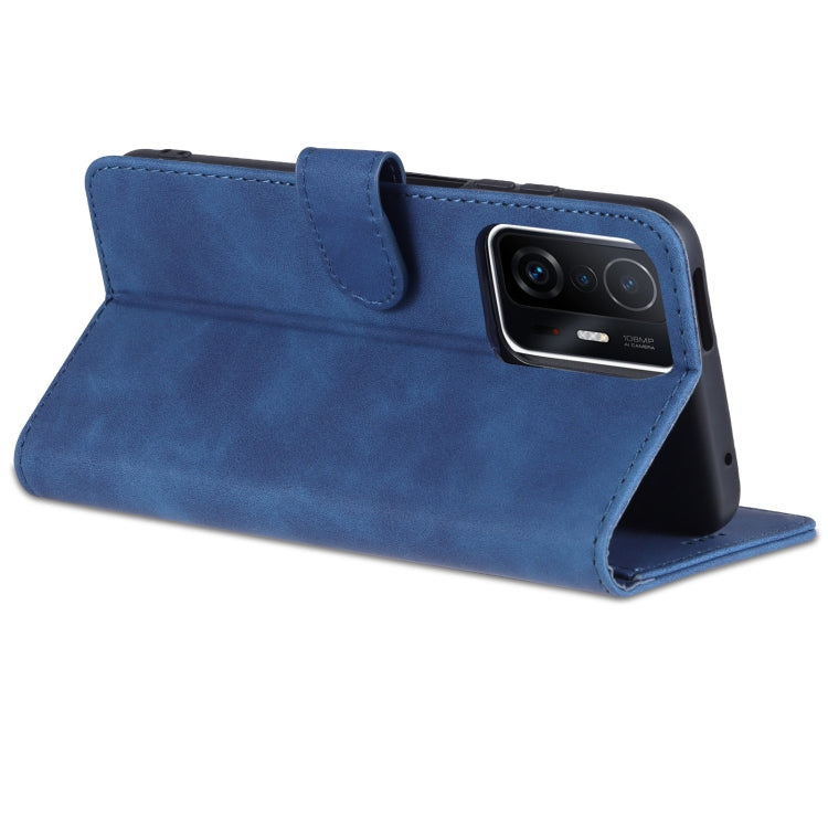 Blue folio flip phone case with flip cover and built-in stand for desk viewing