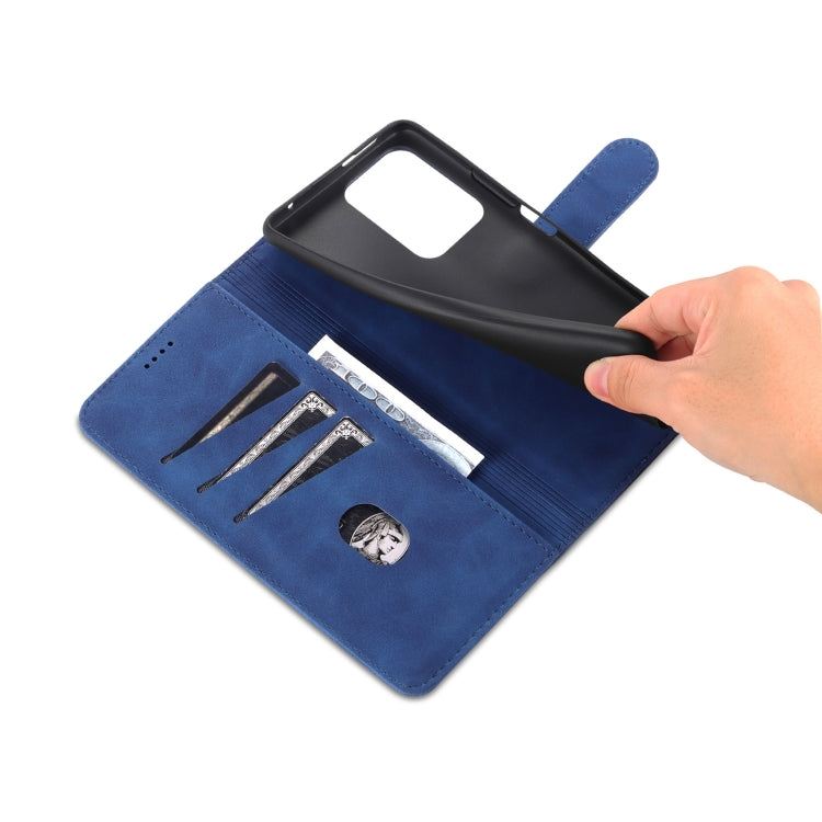 Blue flip phone case opened with internal card slots and snap-style band