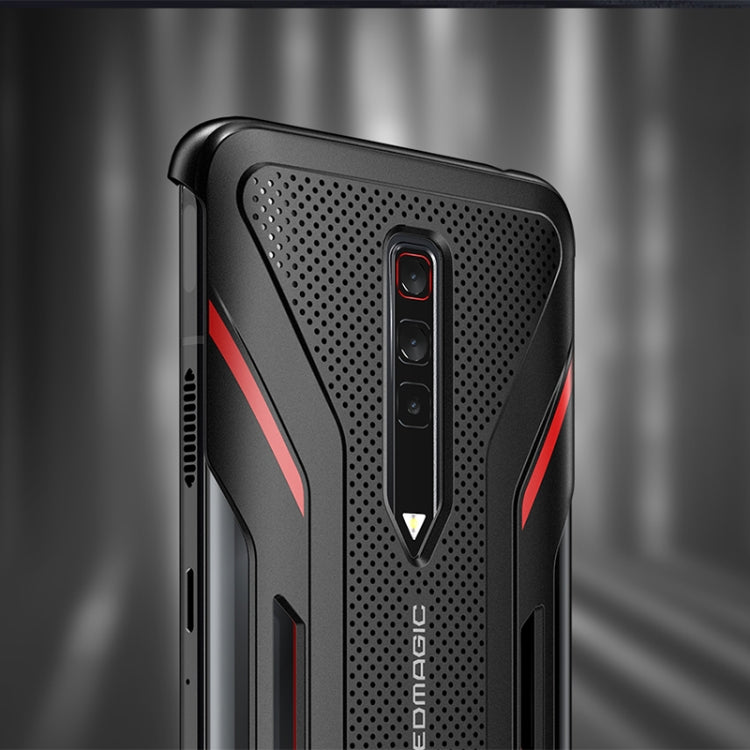 Close-up of black phone case back with perforated texture and red side stripes