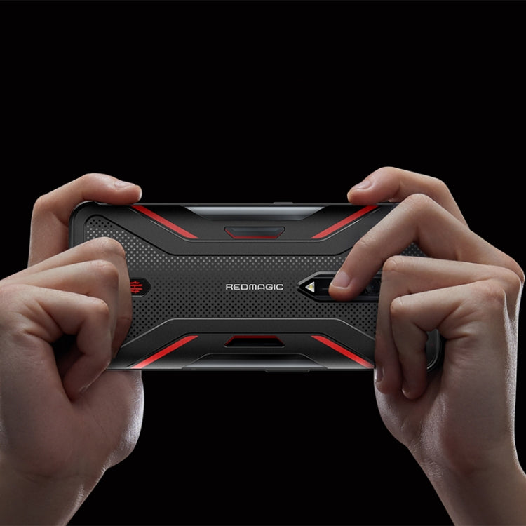 Phone case held by hands, matte black with red trim and bumper edges