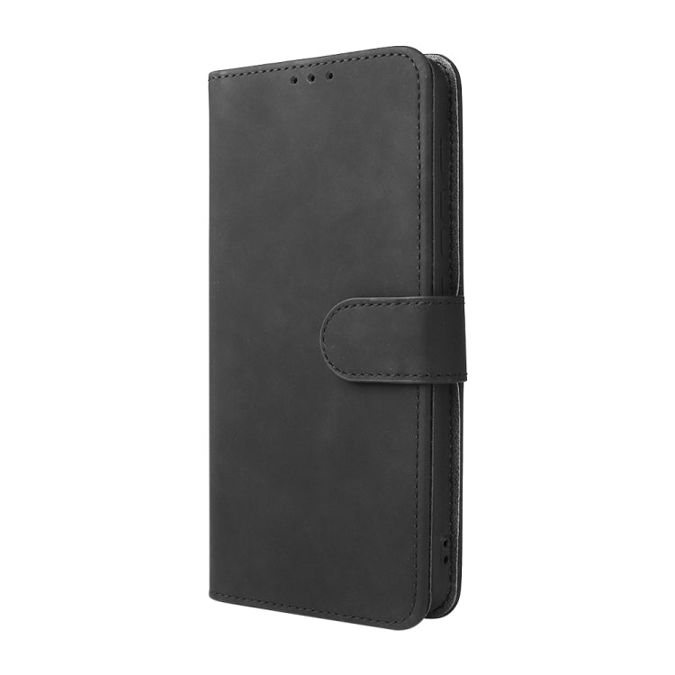 Black magnetic flip phone case with snap closure and front card slot