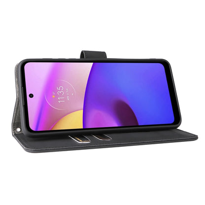 Black flip phone case folded back as a stand for the phone screen
