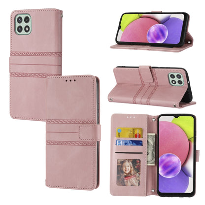Pink leather flip phone case with embossed stripes, magnetic closure, and card slots