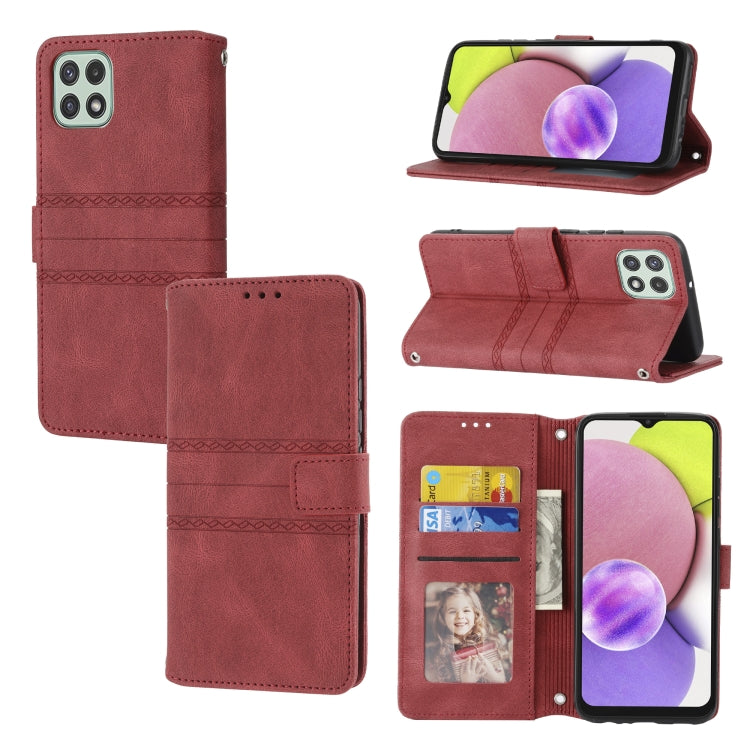 Embossed striped magnetic buckle leather flip phone case, red, card slots and kickstand