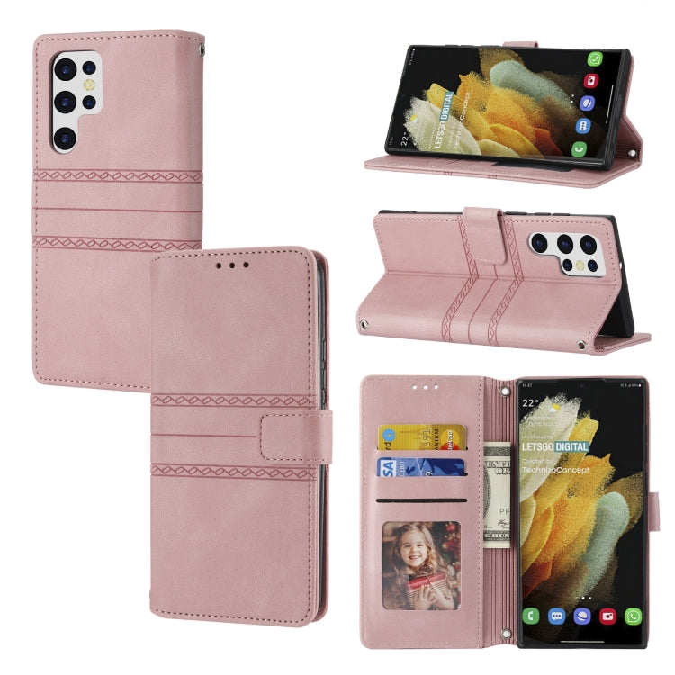 Light pink leather flip phone case with embossed stripes, magnetic buckle, and card slots