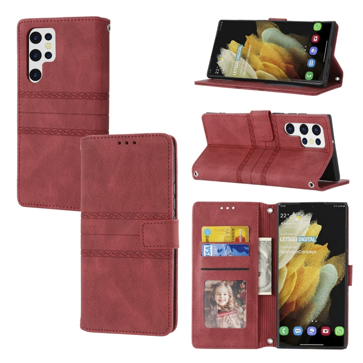 Embossed striped magnetic buckle leather flip phone case, burgundy, card slots and kickstand