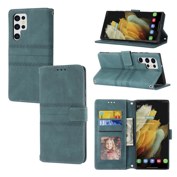 Embossed striped magnetic buckle leather flip phone case, teal, card holder and stand