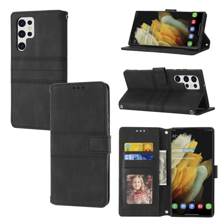 Black leather flip phone case with magnetic closure, embossed stripes, card pockets